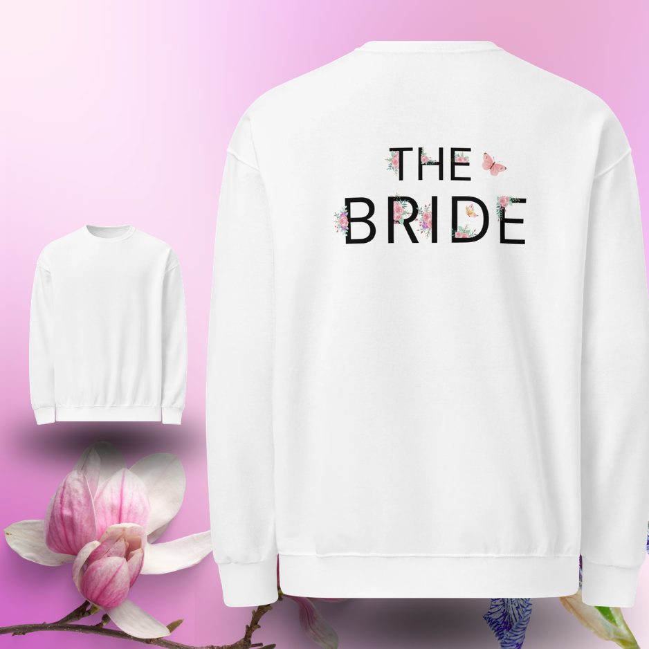 Sweat blanc The Bride avec grand design floral dans le dos et devant minimaliste, parfait pour future mariee pendant un EVJF.