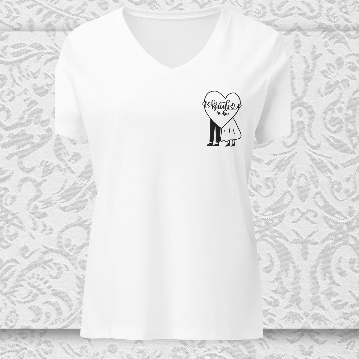 Vue a plat d un t-shirt col V pour femme blanc avec la broderie bride to be sur la poitrine