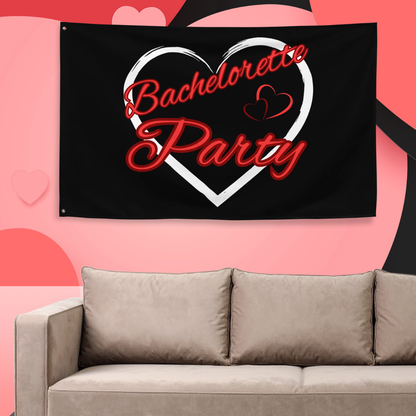 Black Bachelorette Party flag with red lettering and white heart design hanging on wall above sofa, perfect decoration for bachelorette party or EVJF celebration.