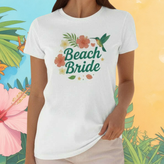 Woman wearing white “Beach Bride” t-shirt with tropical flowers and leaves, perfect outfit for beach bachelorette party, destination wedding or bridal trip.