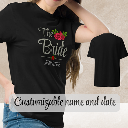 Woman wearing a black “The Bride” t-shirt customized with name and floral graphic.