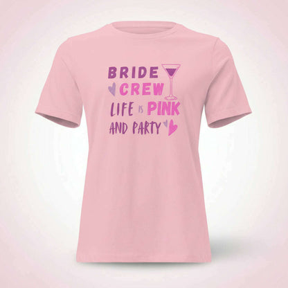 Pink women’s t-shirt featuring “Bride Crew – Life Pink and Party” design, fun outfit for hen party, bachelorette weekend or girls celebration.