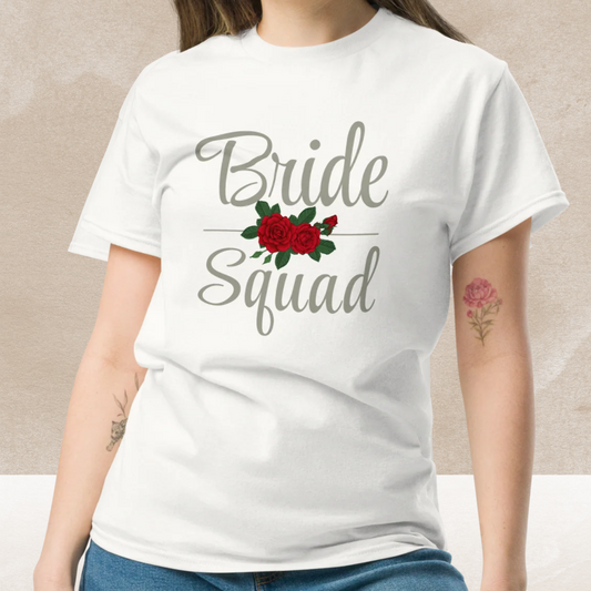 Woman wearing a white Bride Squad t-shirt with floral design and red roses for bachelorette party.