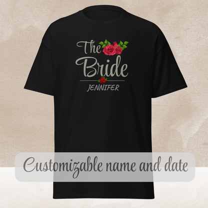 Black “The Bride” t-shirt with floral design and custom name displayed flat.
