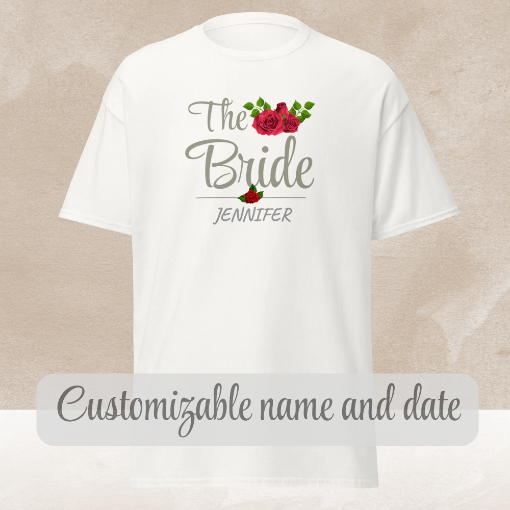 White “The Bride” t-shirt with floral design and custom name displayed flat.