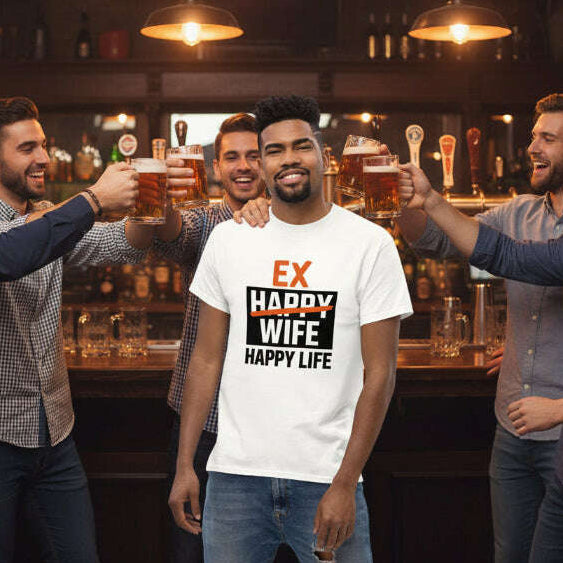 Man wearing an Ex Happy Wife Happy Life graphic t shirt while celebrating with friends at a bar, humorous outfit perfect for a divorce party or newly single celebration white.