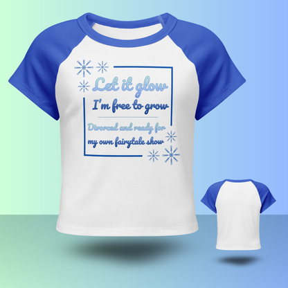 Product mockup of Let it glow divorce party shirt with blue sleeves and inspirational fairytale themed text