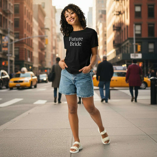 Woman wearing black t-shirt with minimalist “Future Bride” white lettering, stylish outfit for bachelorette party, bridal shower or wedding weekend.