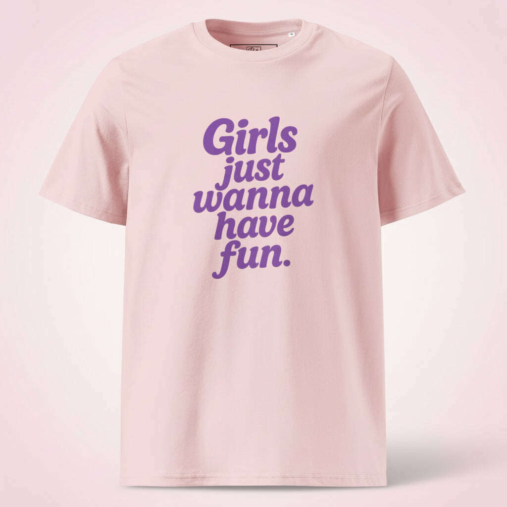 Pink women’s t-shirt with purple “Girls Just Wanna Have Fun” slogan, fun outfit for girls night, bachelorette party or summer celebration.