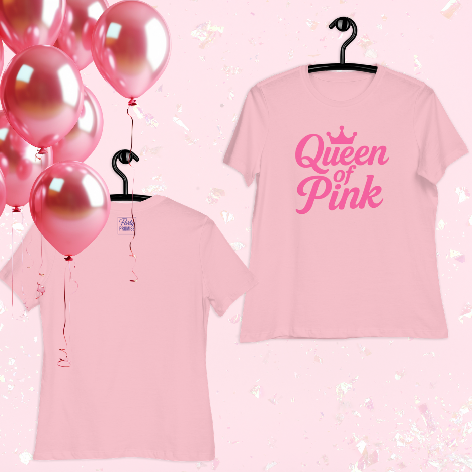  “Queen of Pink” graphic t-shirts displayed with balloons, ideal outfit for bachelorette party, girls celebration or pink themed event.