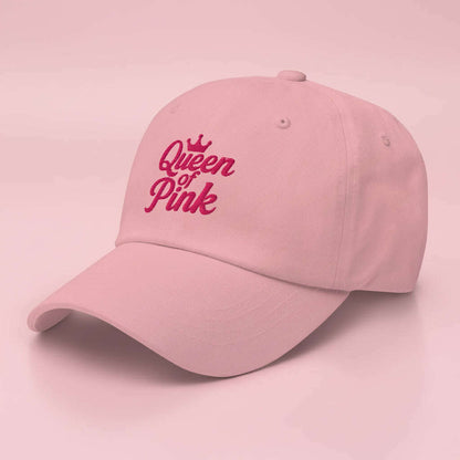 Pink women’s cap featuring “Queen of Pink” embroidery, fashionable accessory for pink party outfit, girls weekend or summer festival.