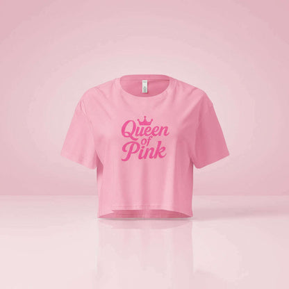 Pink women’s crop top with “Queen of Pink” crown design, stylish outfit for bachelorette party, girls trip or pink themed celebration.