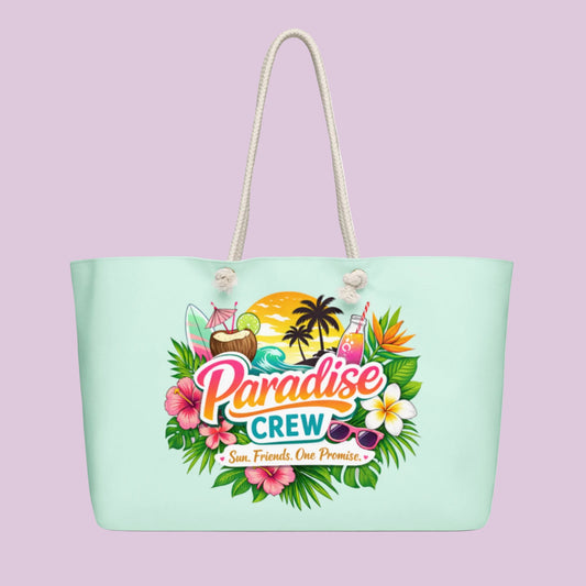 Vue latérale du sac Paradise Crew montrant la largeur du tote, parfait pour transporter serviette, crème solaire, lunettes et essentiels de plage.