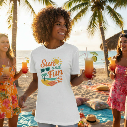 Woman wearing white Sun and Fun t shirt holding tropical drinks at beach picnic with friends perfect for summer vacation and girls trip outfit White