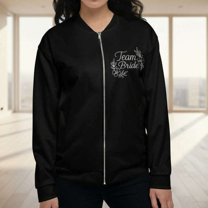 Black zip up hoodie with elegant Team Bride white script design on chest perfect for bridal party weekend and bachelorette outfit Black