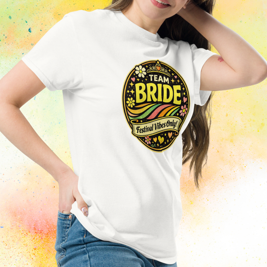 Woman wearing Team Bride Festival Vibes Only retro bachelorette party t shirt with colorful vintage print, perfect bridal squad outfit for hen party celebration weekend white