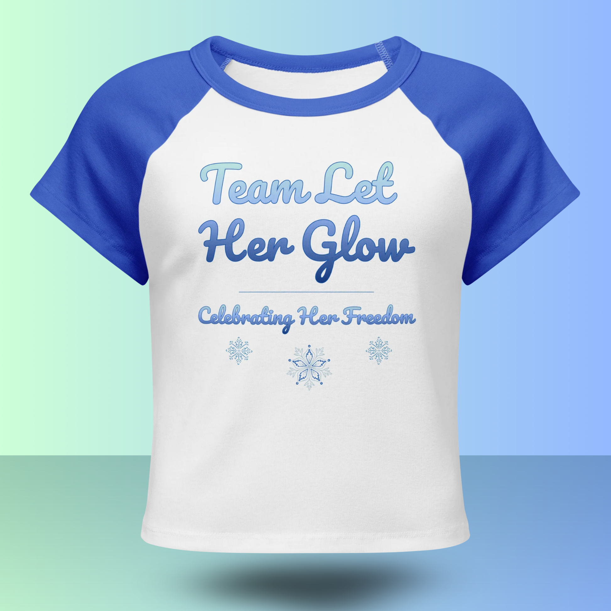 Front view of Team Let Her Glow divorce party t-shirt with snowflake design, perfect outfit for celebrating her freedom and matching divorce party crew looks.