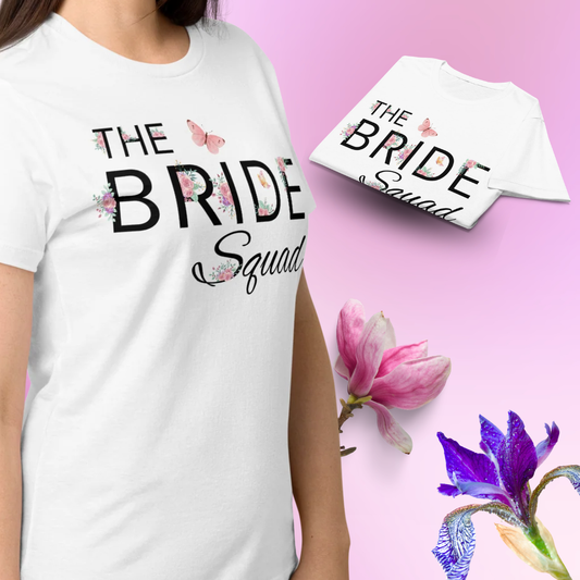 White The Bride Squad t shirt with floral design on the front and folded shirt display, ideal for bride squad during bachelorette party celebrations.
