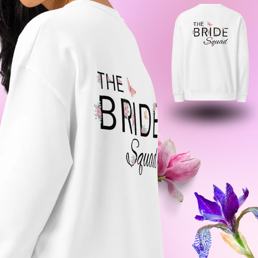 White The Bride Squad sweatshirt with floral back design worn on model, perfect cozy outfit for bride squad during bachelorette party or wedding weekend.