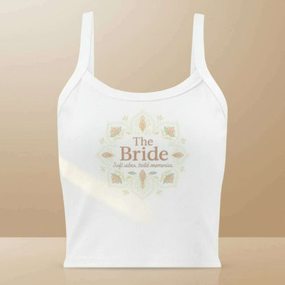 White women’s tank top with elegant “The Bride” floral design in soft gold tones, perfect outfit for bridal shower, bachelorette party or wedding weekend.