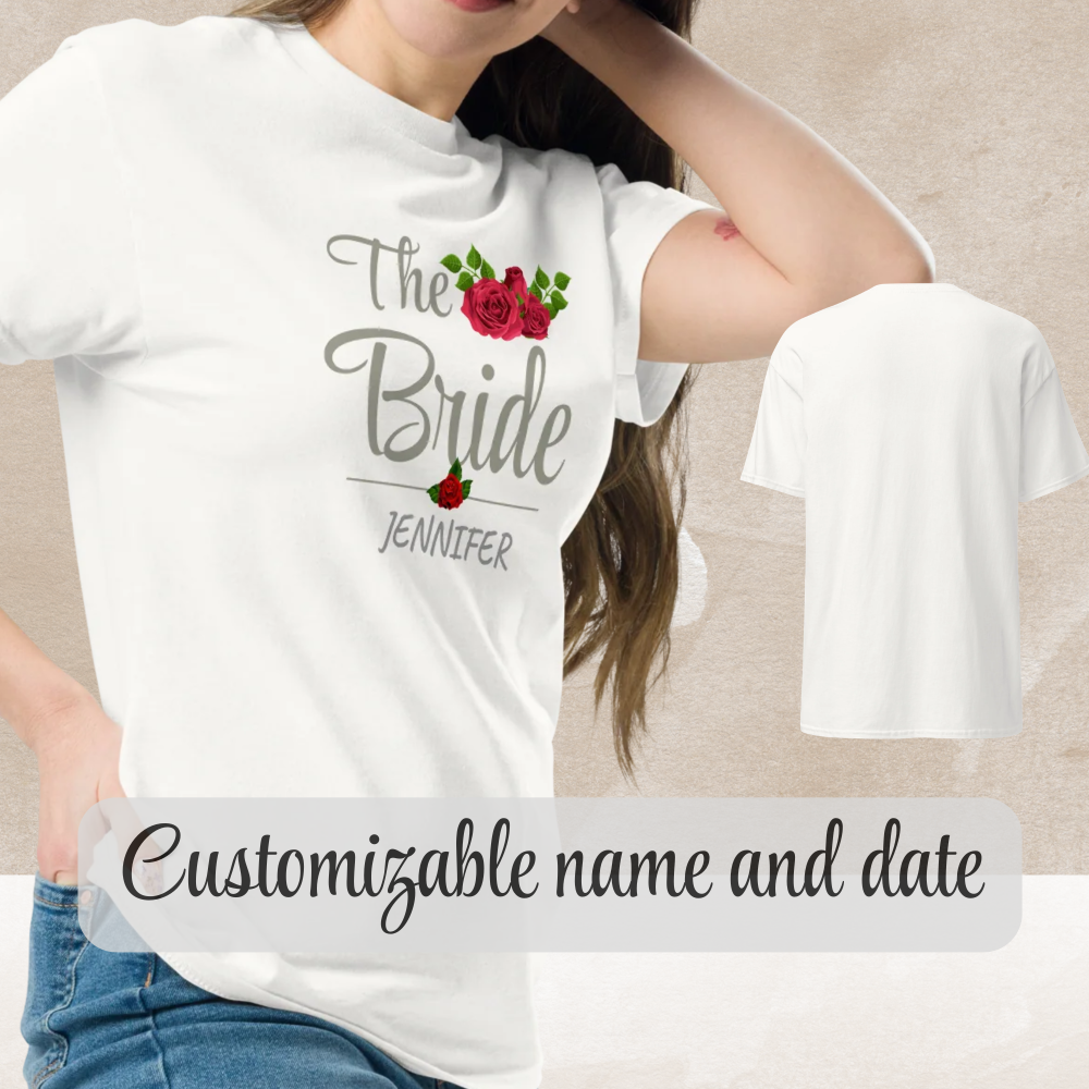 Woman wearing a white “The Bride” personalized t-shirt with custom name and floral design.