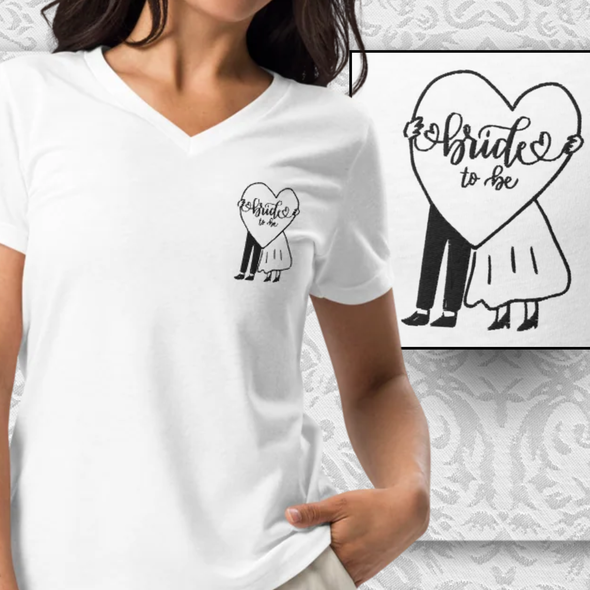 Gros plan sur un t-shirt blanc col V pour femme avec motif brode bride to be representant un couple dans un coeur
