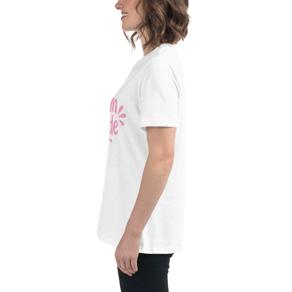 Model wearing the white and pink Team Bride t-shirt paired with casual jeans. The feminine pink print and simple design make it perfect for bachelorette outfits.