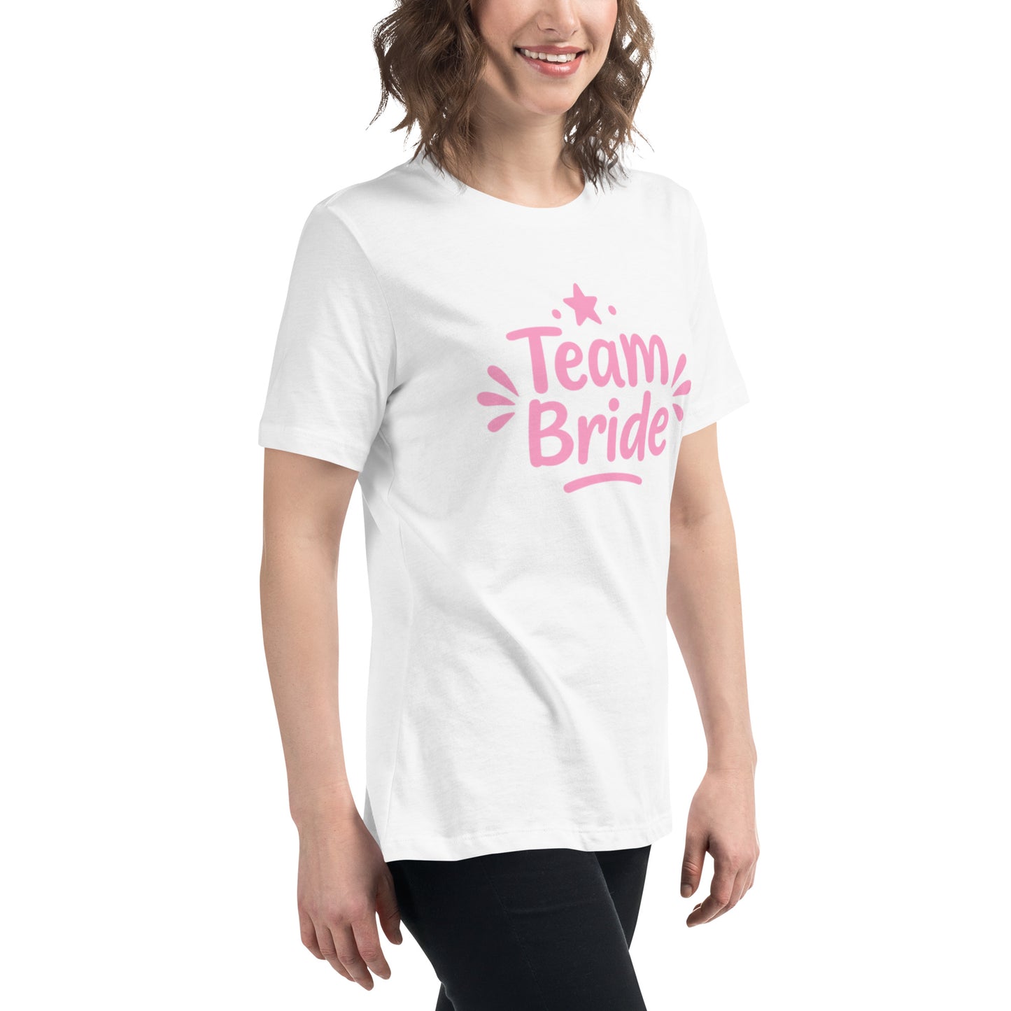 Model wearing the white “Team Bride” t-shirt with pink lettering on a clean white background. The bright print and soft cotton create a fresh Pink Party look.