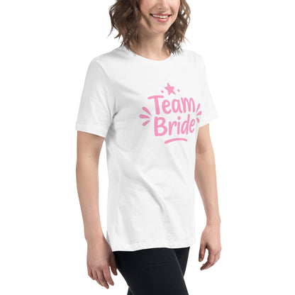 Model wearing the white “Team Bride” t-shirt with pink lettering on a clean white background. The bright print and soft cotton create a fresh Pink Party look.